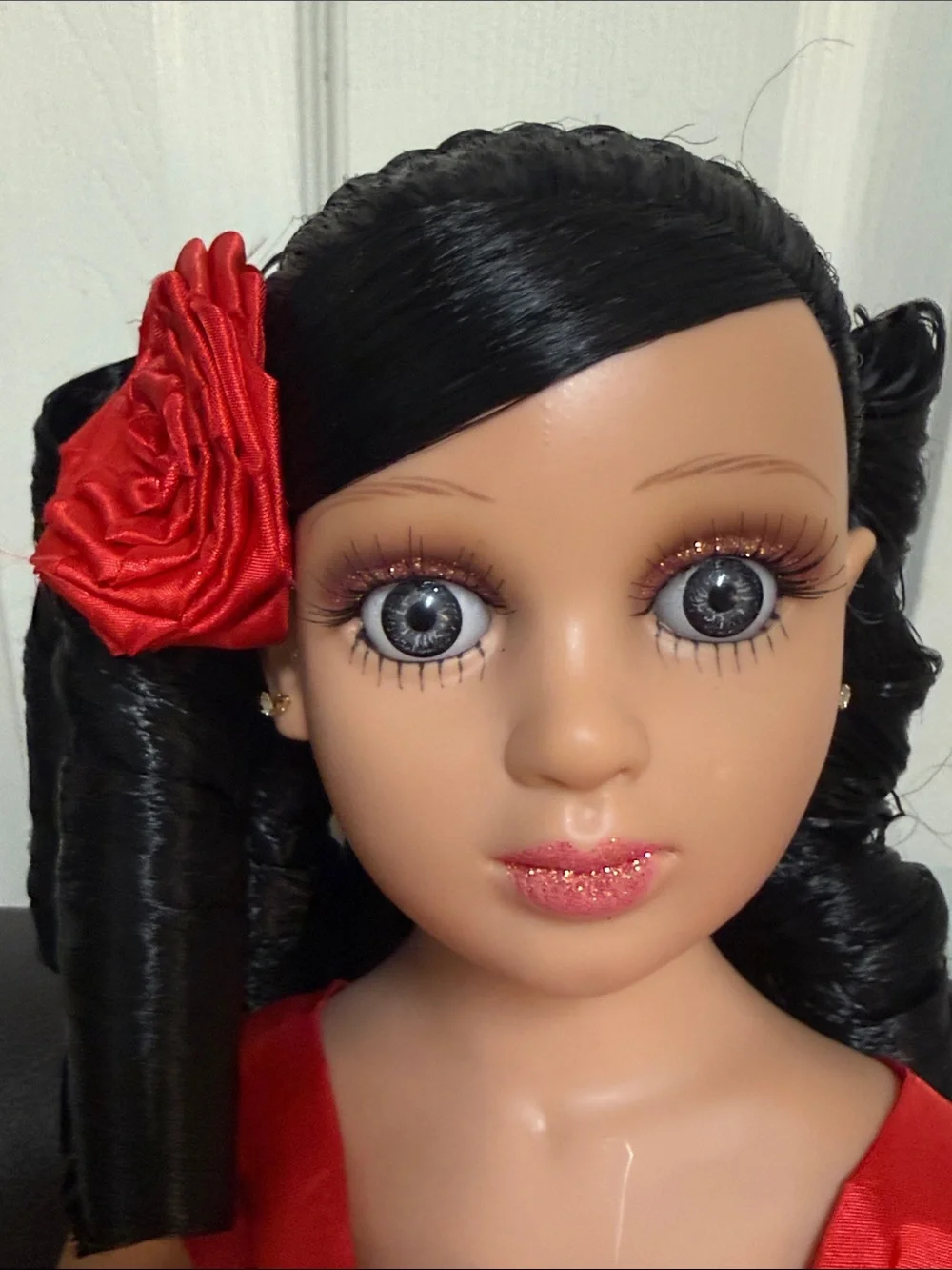 24-inch Quinceañera Keepsake Doll Wearing A Layered, sparkly Red Gown.